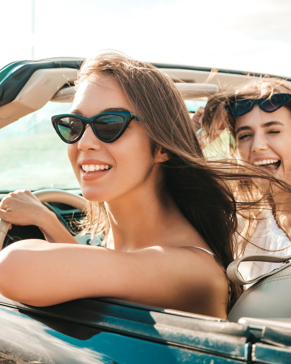 Professional Chauffeur Services with Exotic Car Rental in Tampa 5 two young beautiful smiling hipster female exotic car